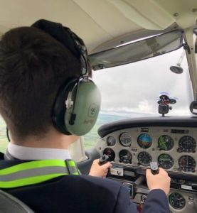 Owen flying a small 4-seater plane